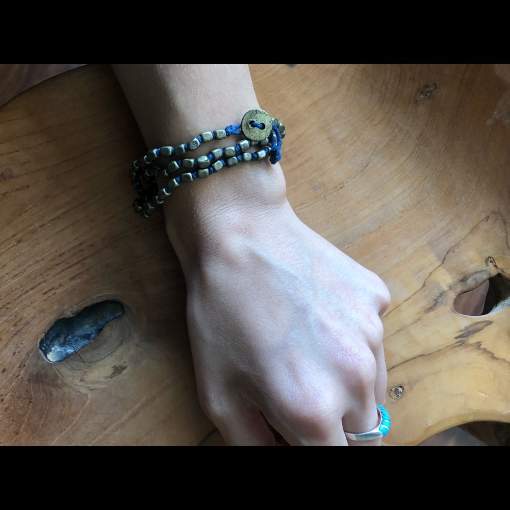 Wrap bracelet with metal beads and navy blue rope
